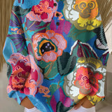 Iskra – Šareni pulover s velikim cvjetnim motivima