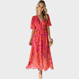 Ranka - Cvjetna midi haljina s puf rukavima i V-izrezom